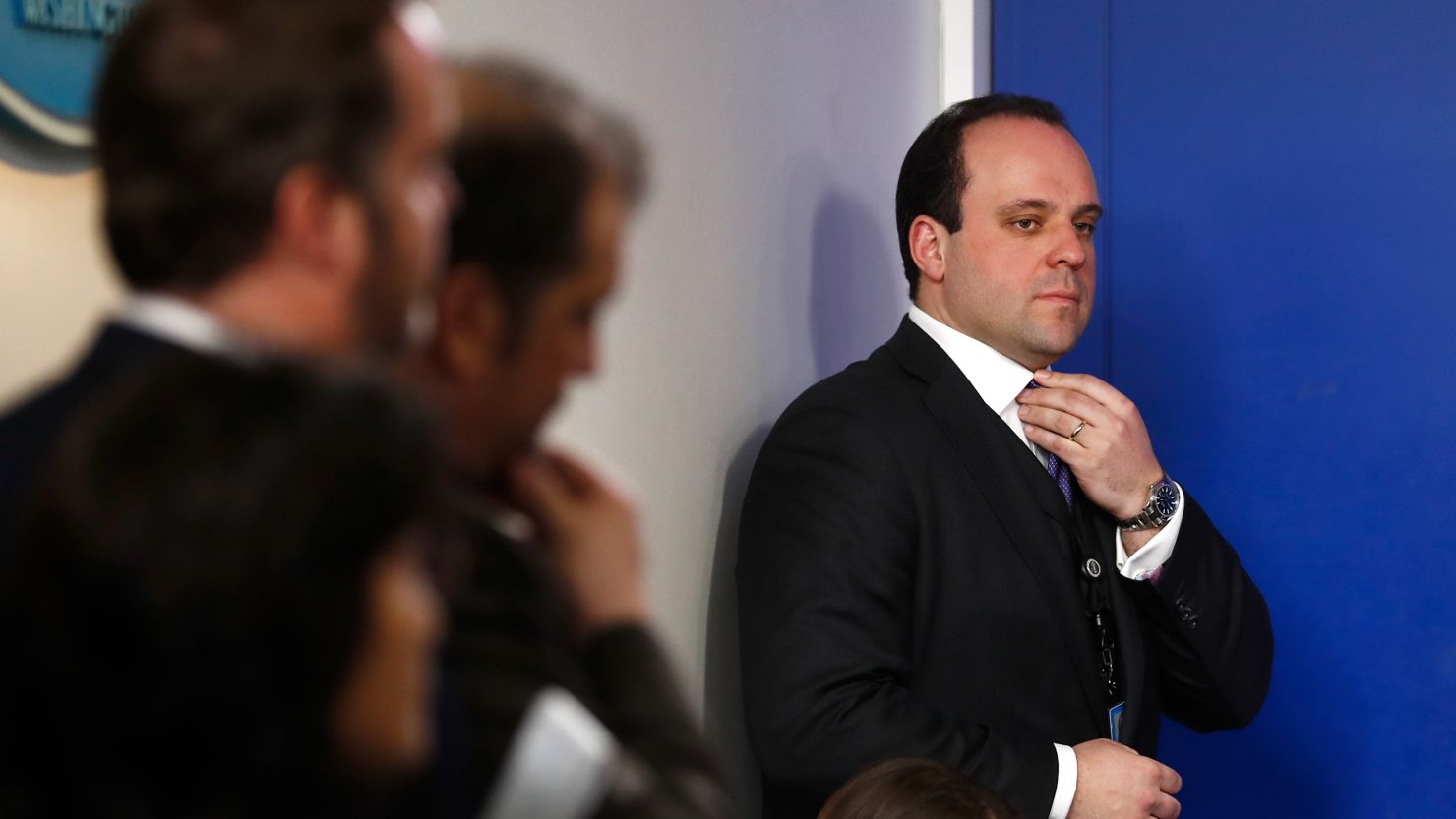 Boris Epshteyn stands to the side of the briefing room as White House press secretary Sean Spicer speaks during the daily news briefing at the White House, in Washington, Tuesday, Feb. 7, 2017. (AP Photo/Carolyn Kaster)
