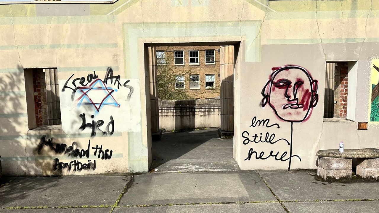 Vandals spraypainted graffiti on the façade of a Seattle Jewish temple Sunday.