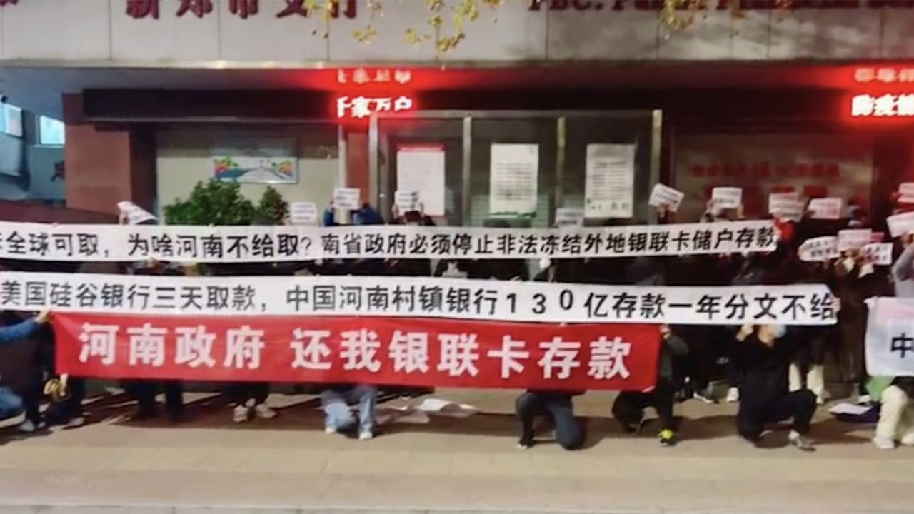 Bank victims protest outside of bank branch in Henan, in April 2023.