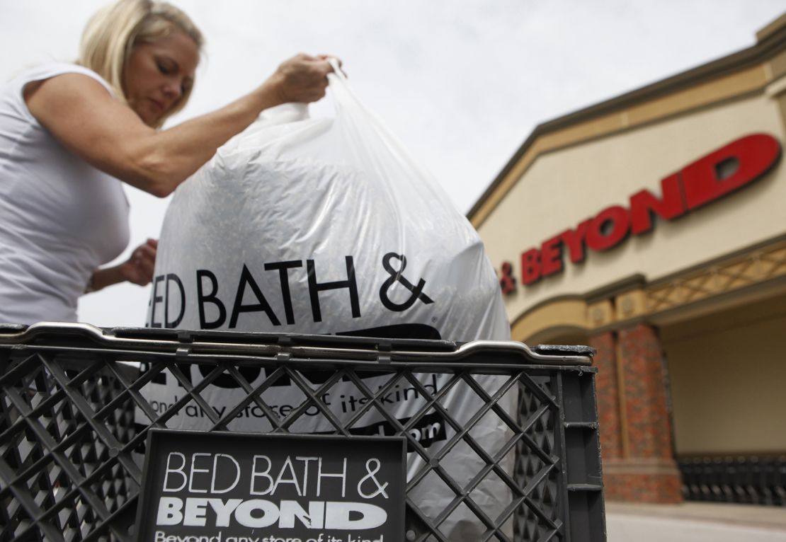 Chris Hammons unloads a bag of items she purchased at a Bed Bath & Beyond store in Dallas, Texas September 23, 2009. 