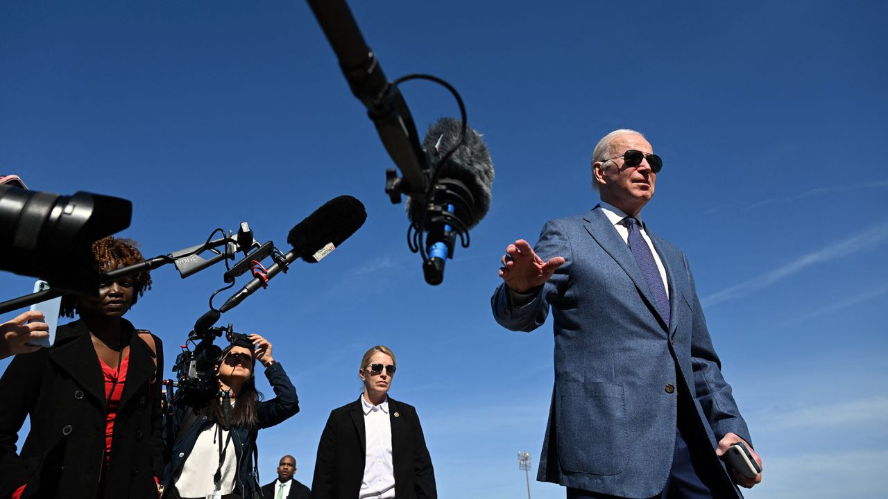 President Joe Biden speaks to the press before boarding Air Force One, as he departs for Northern Ireland, at Joint Base Andrews in Maryland on April 11.