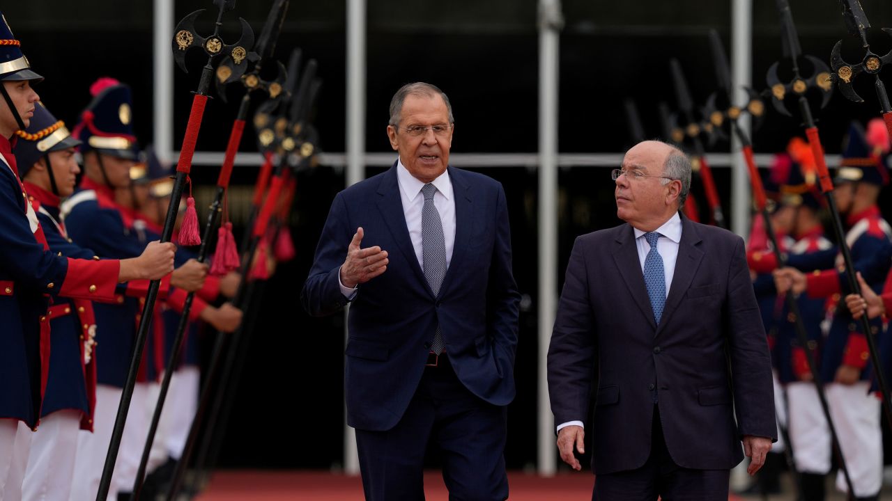 Russia's Foreign Minister Sergey Lavrov, left, talks with Brazilian Foreign Minister Mauro Vieira as he leaves Itamaraty Palace in Brasilia, Brazil, on Monday.