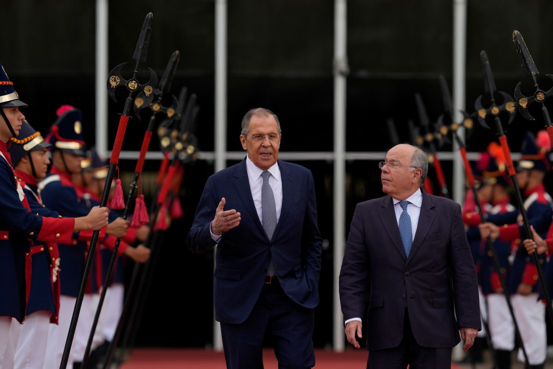 Russia's Foreign Minister Sergey Lavrov, left, talks with Brazilian Foreign Minister Mauro Vieira as he leaves Itamaraty Palace in Brasilia, Brazil, on Monday. 