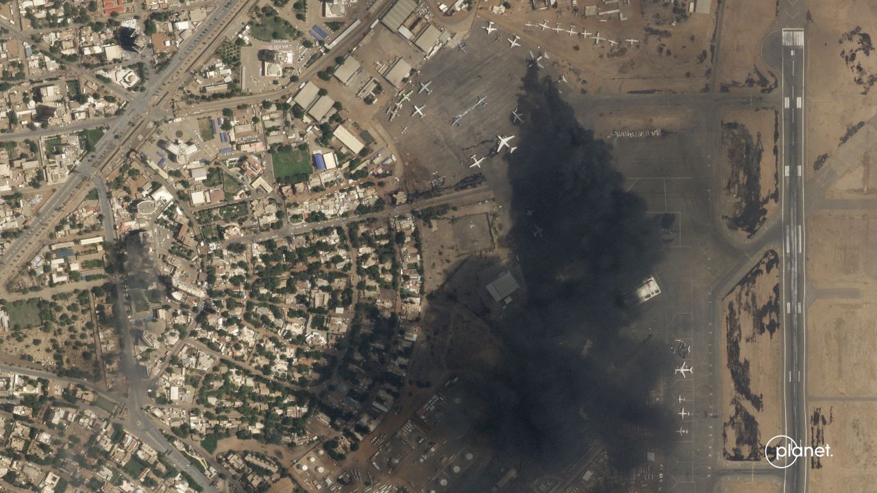This satellite photo shows two burning planes at Khartoum International Airport in Sudan on Sunday, April 16. People have been desperately trying to flee Sudan's capital city, where <a href="https://www.cnn.com/2023/04/20/africa/sudan-violence-thursday-hospitals-crisis-intl/index.html" target="_blank">intense violence between rival factions</a> is overwhelming hospitals. Multiple attempts to bring about a ceasefire have failed.