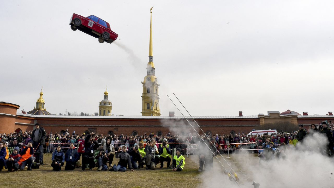 TOPSHOT - Rocket model looked as a Soviet auto launches during a display of model rockets near The Peter and Paul Fortress in Saint Petersburg on April 16, 2023, as the part of the celebration of the 62th anniversary of Russia's Yuri Gagarin's first manned flight into space. (Photo by Olga MALTSEVA / AFP) (Photo by OLGA MALTSEVA/AFP via Getty Images)