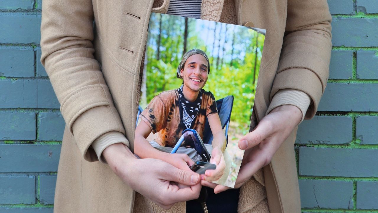 Vienna holds a photo of her slain partner, Tortuguita, in Atlanta on Thursday, Jan. 26, 2023. Officials have said officers fatally shot Tortuguita in self-defense after the protester shot a trooper on Wednesday, Jan. 18, but activists argue it was a state-sanctioned murder of a beloved community member who was renowned for having a big heart. (AP Photo/R.J. Rico)