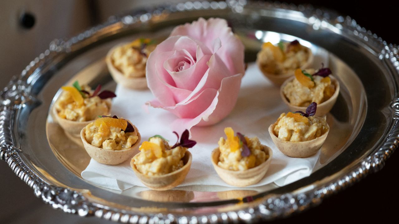 Coronation chicken vol-au-vents are served at a reception for Britain's Queen Elizabeth II with representatives from local community groups to celebrate the start of the Platinum Jubilee on February 5, 2022. - Queen Elizabeth II on Sunday will became the first British monarch to reign for seven decades, in a bittersweet landmark as she also marked the 70th anniversary of her father's death. (Photo by Joe Giddens / POOL / AFP) (Photo by JOE GIDDENS/POOL/AFP via Getty Images)