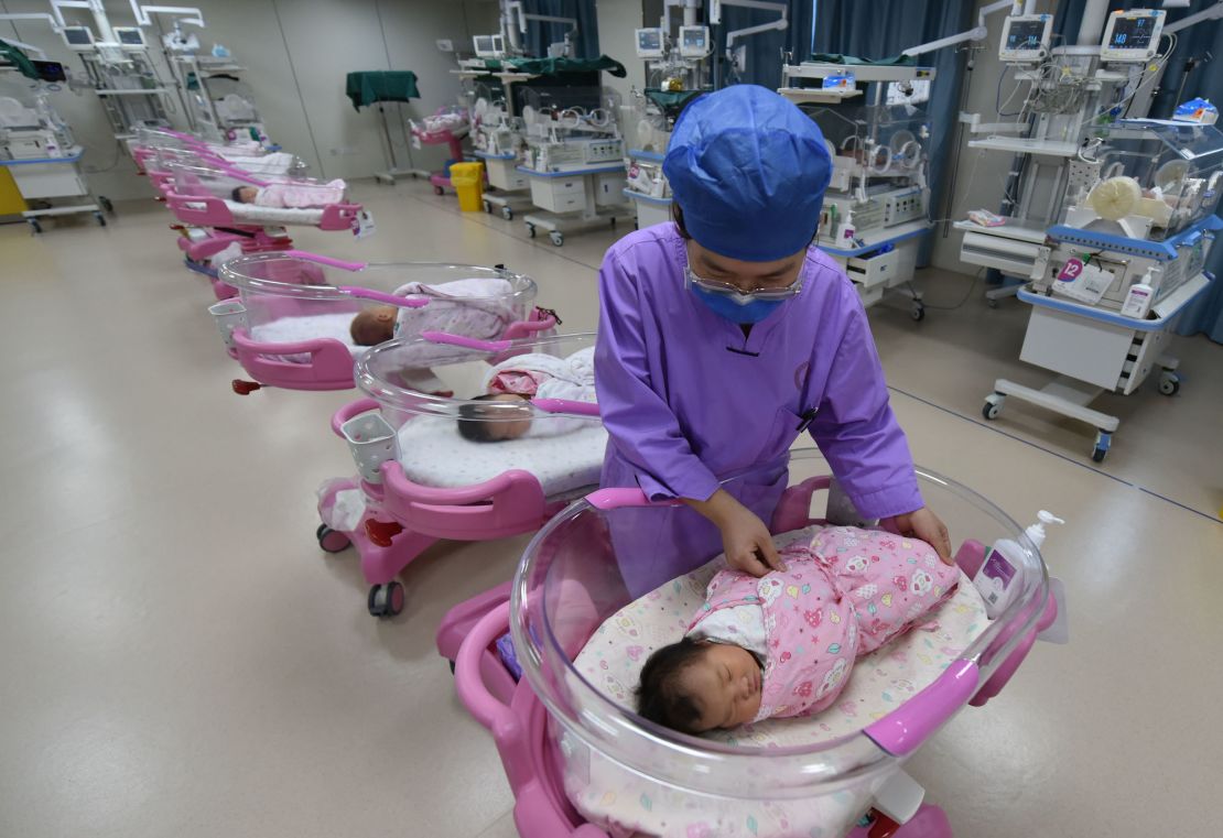 FUYANG, CHINA - AUGUST 8, 2022 - A nurse cares for a newborn at the Women and Children's Hospital in Fuyang City, Anhui Province, China, Aug 8, 2022. The growth rate of China's total population has slowed markedly. (Photo credit should read CFOTO/Future Publishing via Getty Images)
