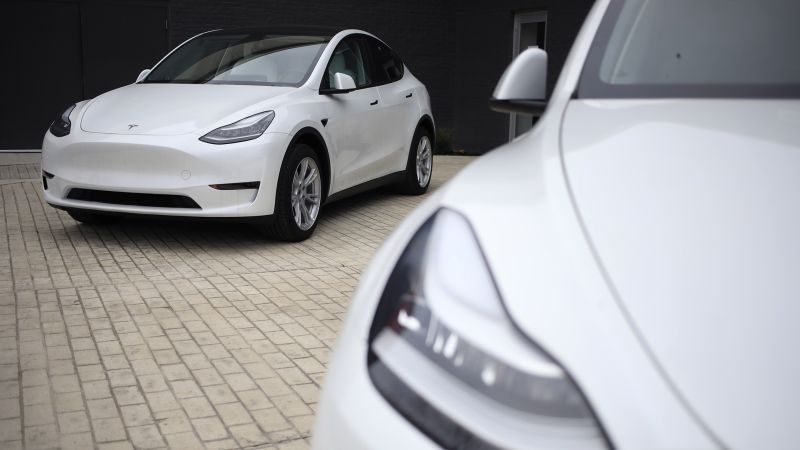 NextImg:Tesla reverses course, raises prices on two top end models | CNN Business