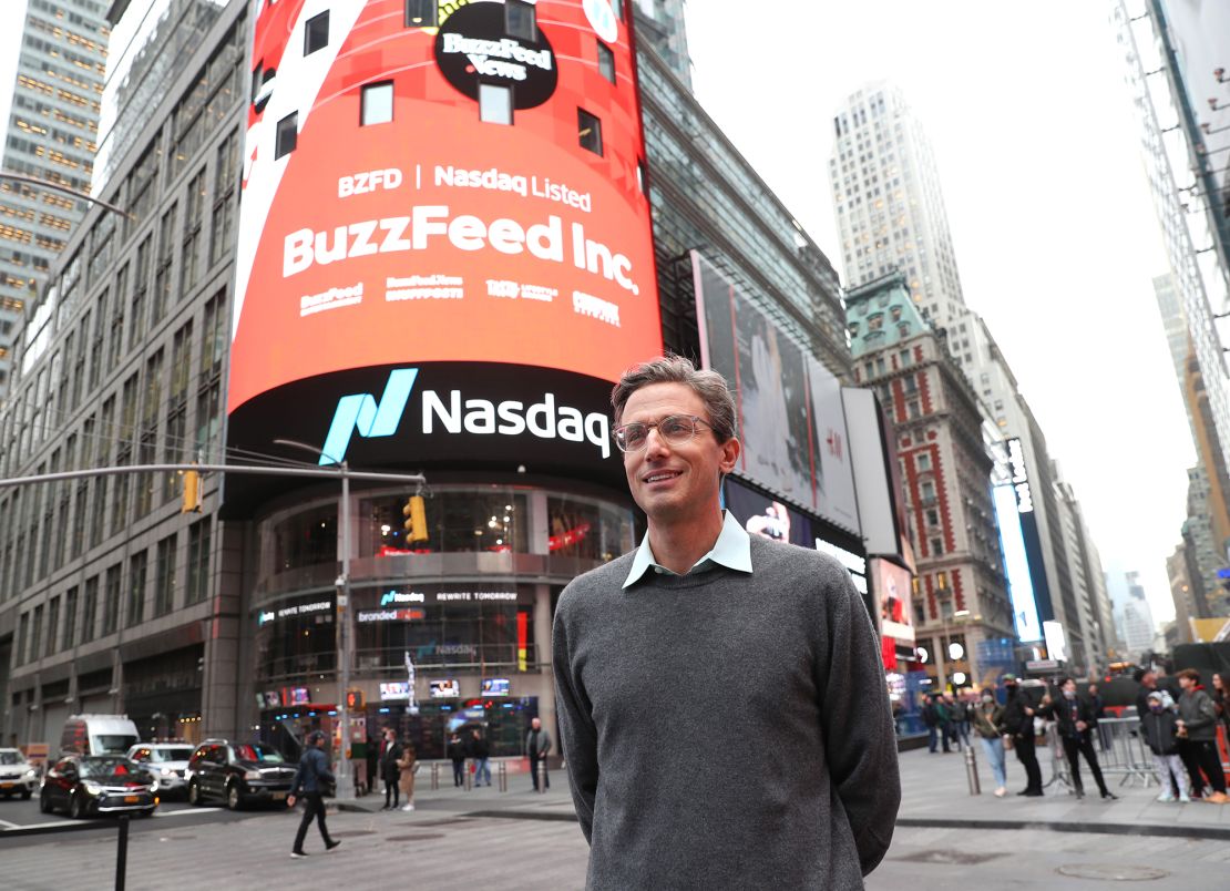 Founder and CEO of BuzzFeed Jonah H. Peretti poses in front of BuzzFeed screen on Times Square during BuzzFeed Inc.'s Listing Day at Nasdaq on December 06, 2021 in New York City. 