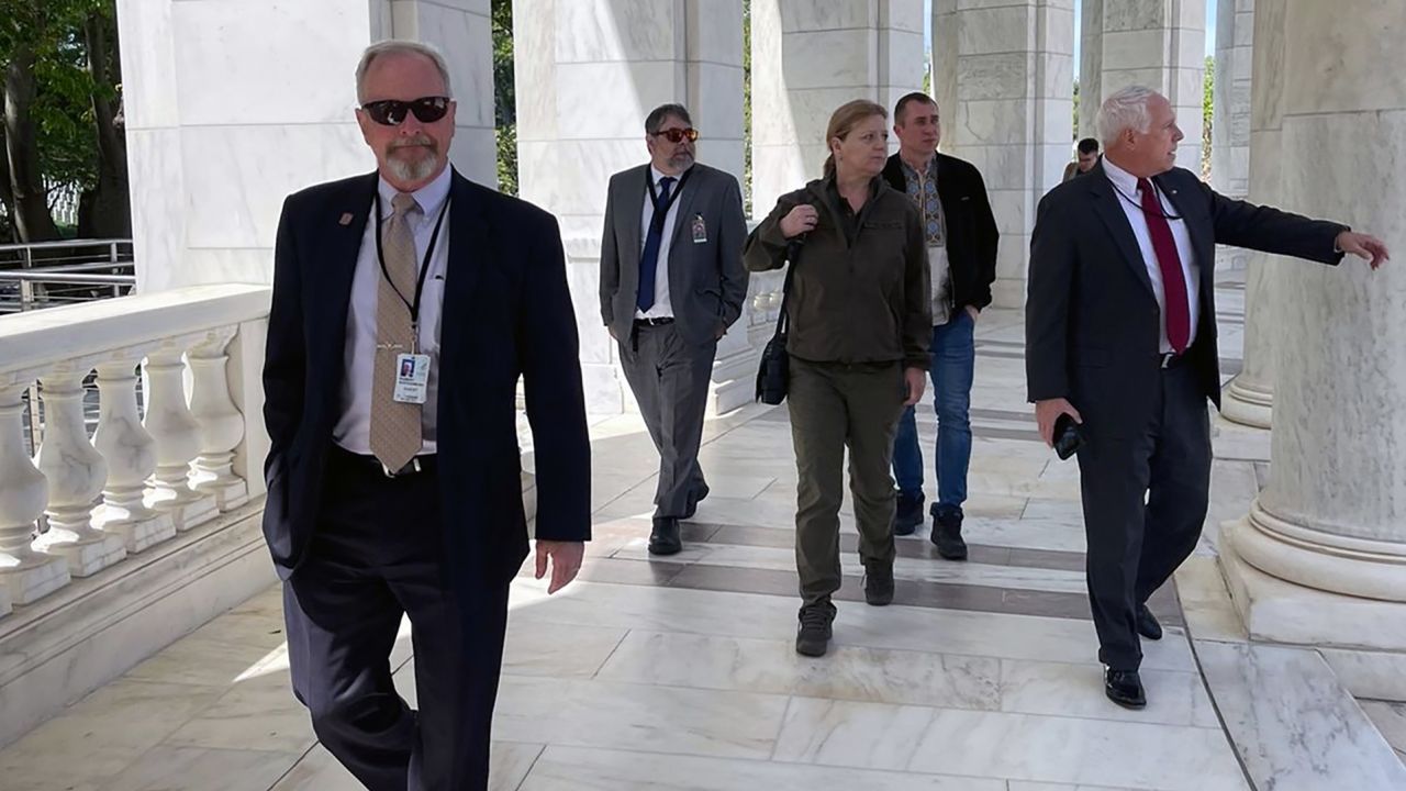  Ukrainian Minister of Veterans Affairs Yulia Laputina visits Arlington National Cemetery in April 2023.