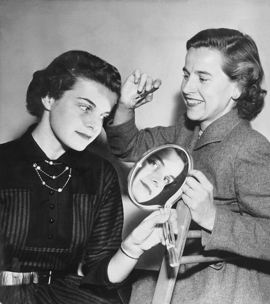 Feinstein gets her makeup touched up for a photo shoot in San Francisco in 1955.