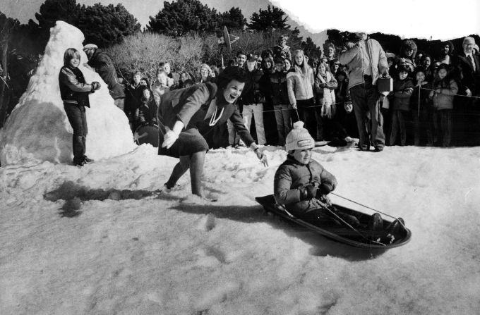 Feinstein pushes a sledder at an event in 1978 where the San Francisco Ice Company spread 17 tons of snow for the annual "Snow-Ball."