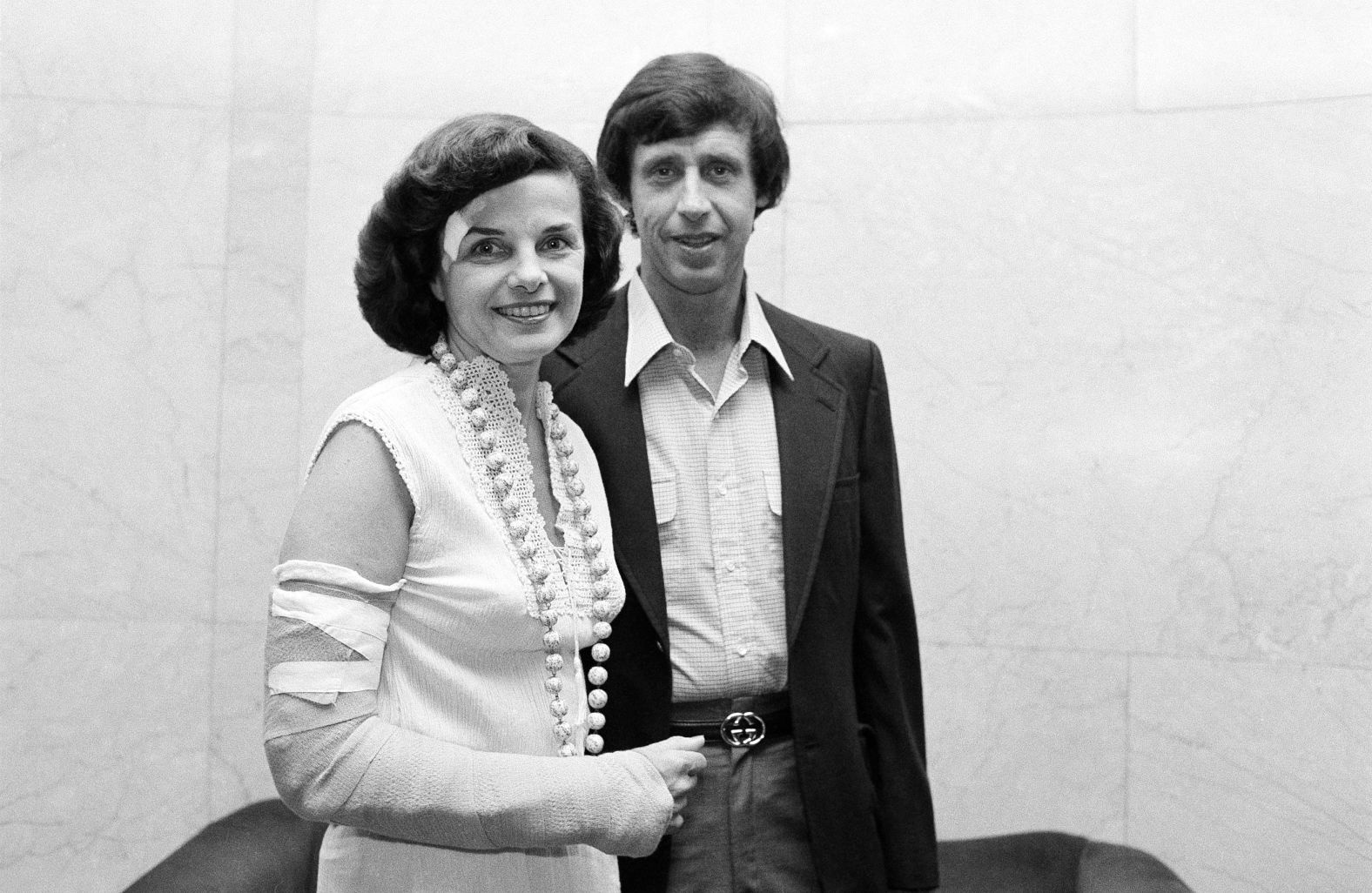 Feinstein poses for a picture with her husband Richard Blum in the lobby of their Washington, DC, hotel in July 1980. Feinstein had fallen and injured herself leaving the White House after a meeting with Vice President Walter Mondale, forcing the delay of the couple's honeymoon.
