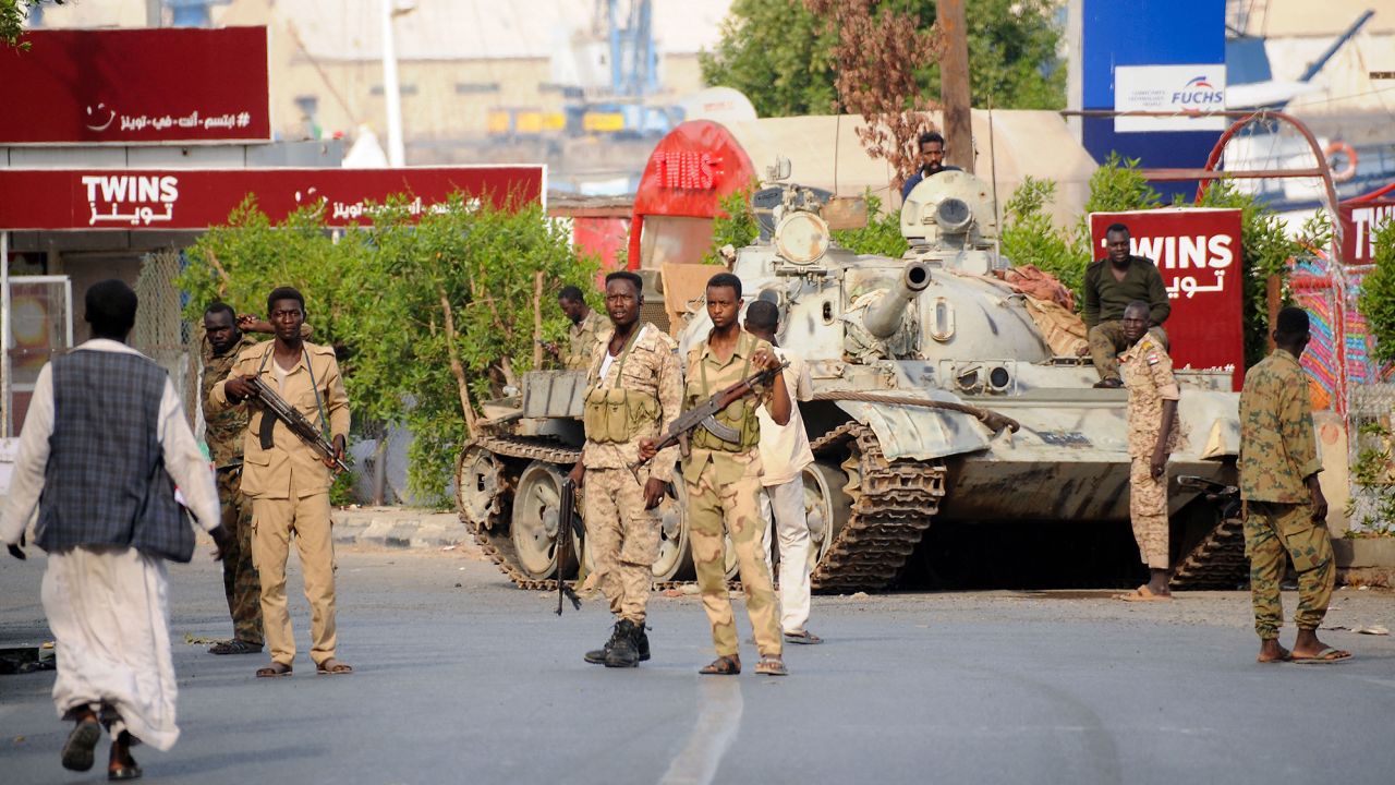 Sudanese army soldiers, loyal to army chief Abdel Fattah al-Burhan, hold a position in the Red Sea city of Port Sudan.