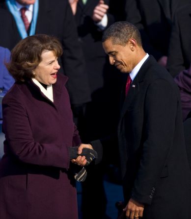 President Barack Obama shakes hands with Feinstein after he was sworn in as the 44th President of the United States in 2009. Feinstein served as the head of the Inaugural Committee.