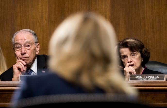 Sen. Chuck Grassley and Feinstein listen as Dr. Christine Blasey Ford testifies during the Senate Judiciary Committee hearing on the nomination of Brett M. Kavanaugh to be an associate justice of the Supreme Court in 2018. Ford accused Kavanaugh of sexually assaulting her during a party in 1982 when they were high school students in suburban Maryland. Kavanaugh denied Ford's allegations. The Senate confirmed Kavanaugh's nomination by a vote of 50-48.
