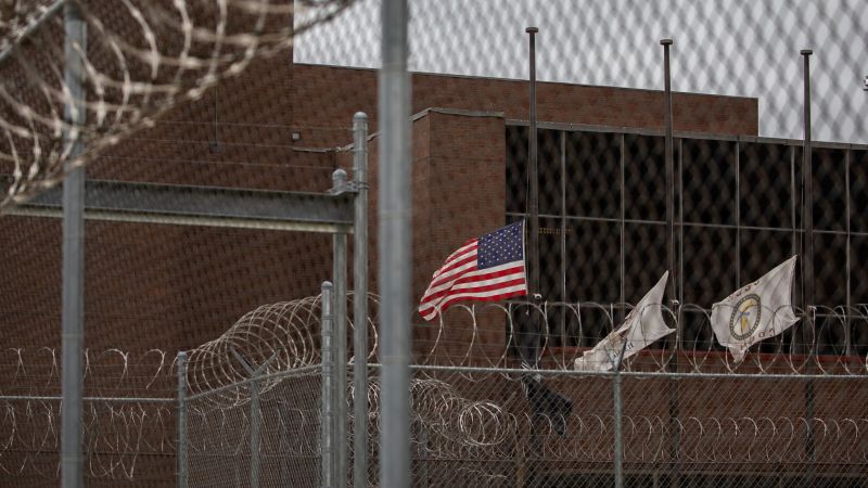 NextImg:Illinois correctional officer charged after surveillance footage shows him repeatedly hitting a man in custody | CNN
