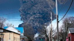 FILE - A black plume rises over East Palestine, Ohio, as a result of a controlled detonation of a portion of the derailed Norfolk Southern trains, Feb. 6, 2023. The federal government filed a lawsuit Thursday, March 30, against railroad Norfolk Southern over environmental damage caused by a February derailment on the Ohio-Pennsylvania border that spilled hazardous chemicals into nearby creeks and rivers.(AP Photo/Gene J. Puskar, File)