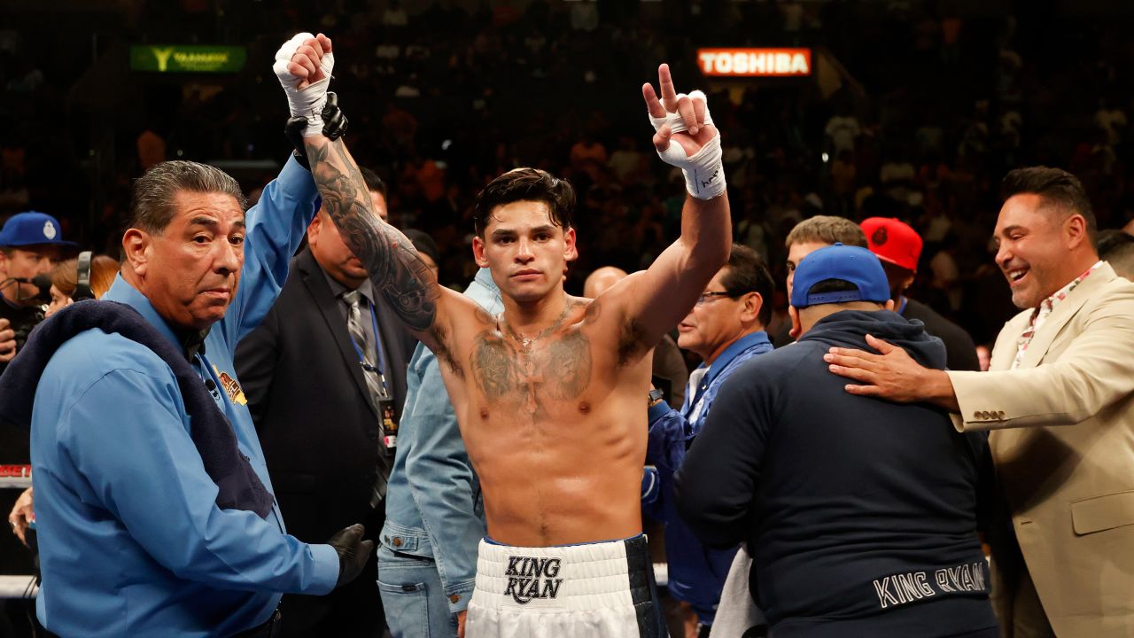 Garcia celebrates after defeating Javier Fortuna in the sixth round of a lightweight bout on July 16, 2022.