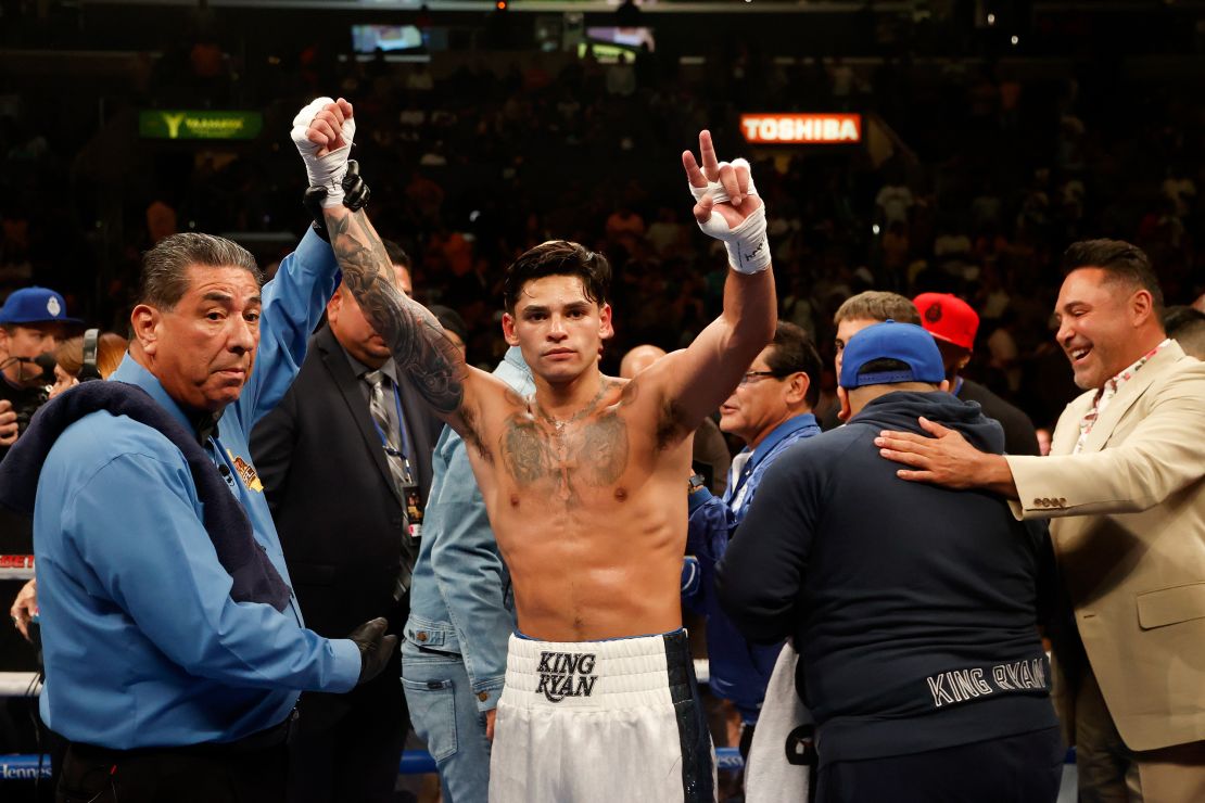Garcia celebrates after defeating Javier Fortuna in the sixth round of a lightweight bout on July 16, 2022.