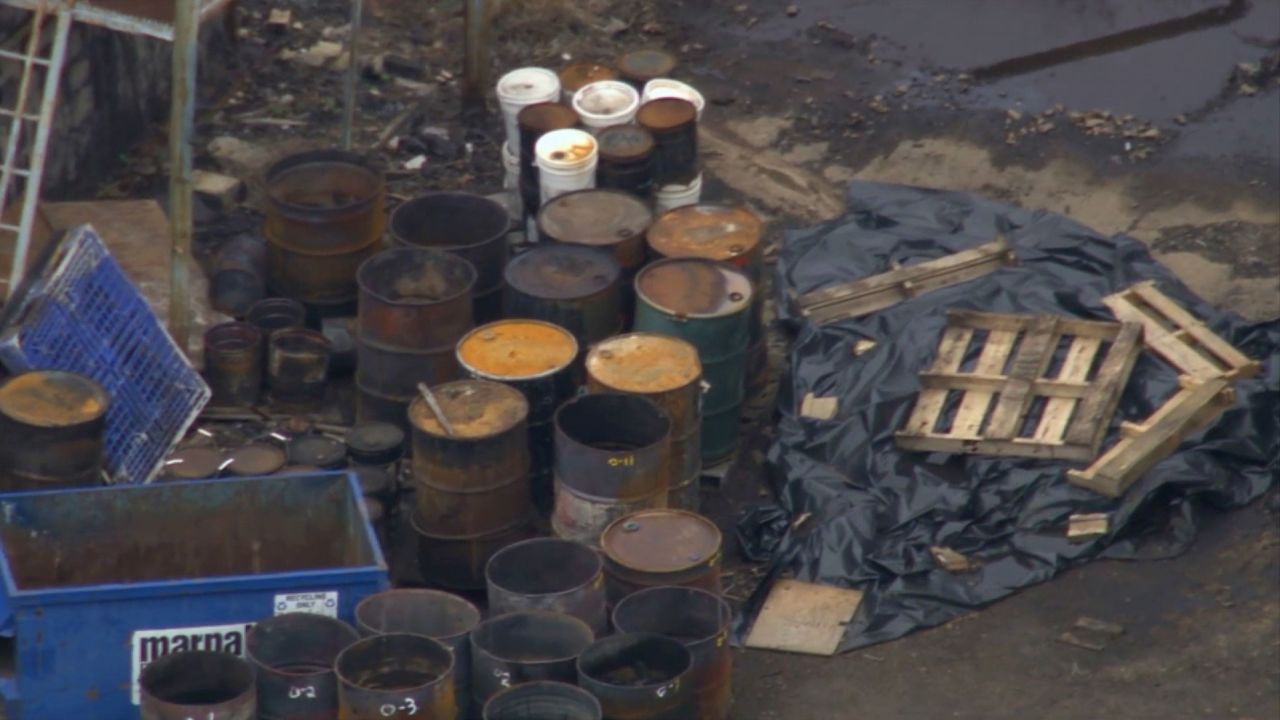 Chemical waste drums at a former industrial site in Howell Township, New Jersey.