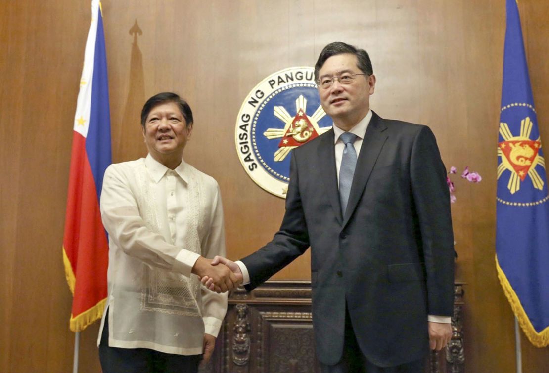 Philippine President Ferdinand Marcos Jr.  shakes hands with Chinese Foreign Minister Qin Gang during a meeting in Manila on April 22, 2023.