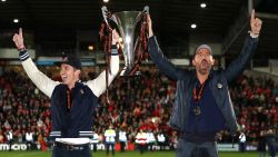 WREXHAM, WALES - APRIL 22: Rob McElhenney and Ryan Reynolds, Owners of Wrexham celebrate with the Vanarama National League trophy as Wrexham win the Vanarama National League and are promoted to the English Football League after victory in the Vanarama National League match between Wrexham and Boreham Wood at Racecourse Ground on April 22, 2023 in Wrexham, Wales. (Photo by Jan Kruger/Getty Images)