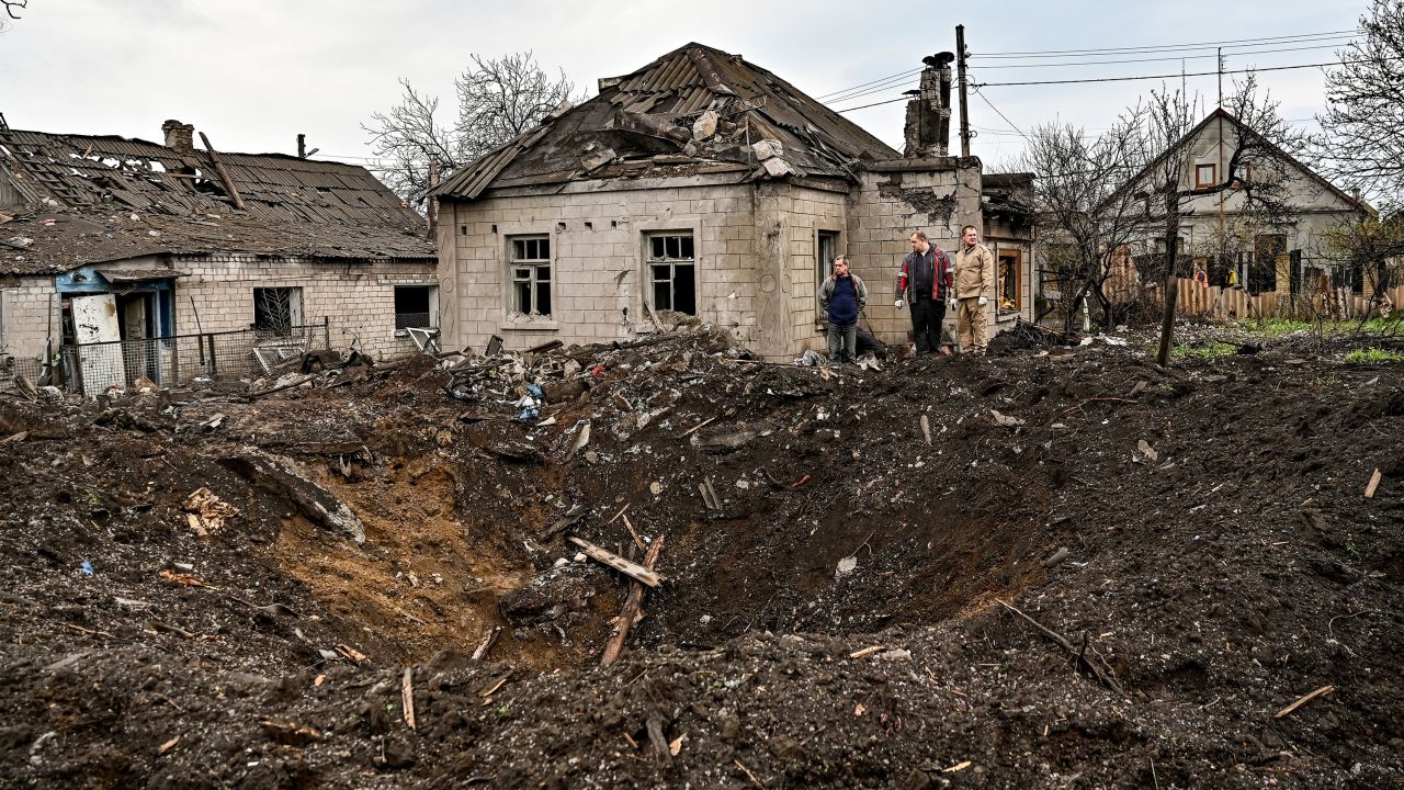 A crater is seen in a residential area after a rocket strike by the  Russian military in Zaporizhzhia,  Ukraine, on April 9, 2023.