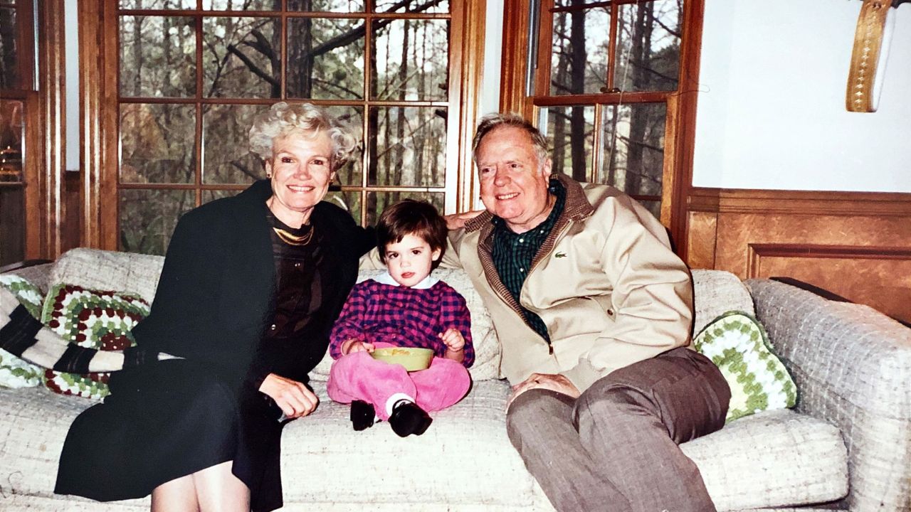 Chloe Melas is shown with her grandparents, Ann and Frank Murphy, in Atlanta in1989. (Courtesy Melas Family Collection)