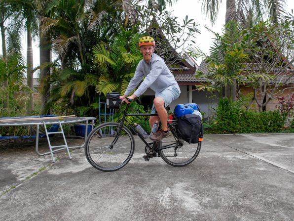 <strong>Challenging times: </strong>The adventurer, seen in Laos, says that cycling through Asia was one of the toughest parts of the journey.