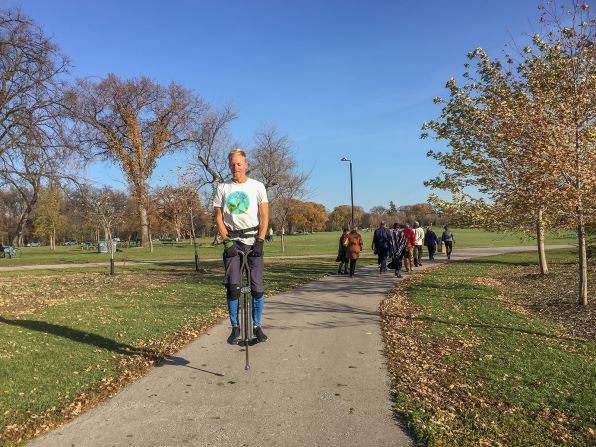 <strong>Sustainable way:</strong> Pukonen, seen traveling through Canadian city Winnipeg on a pogo stick, stresses that he isn't "anti motor," but hopes to inspire others through his journey, as well as challenge perceptions of what people believe is possible.