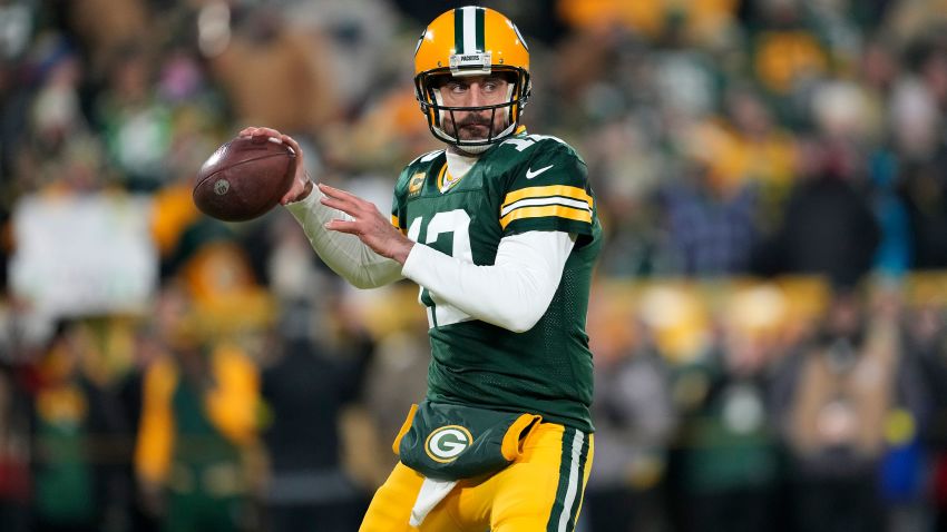 GREEN BAY, WISCONSIN - JANUARY 08: Aaron Rodgers #12 of the Green Bay Packers warms up prior to the game against the Detroit Lions at Lambeau Field on January 08, 2023 in Green Bay, Wisconsin. (Photo by Patrick McDermott/Getty Images)