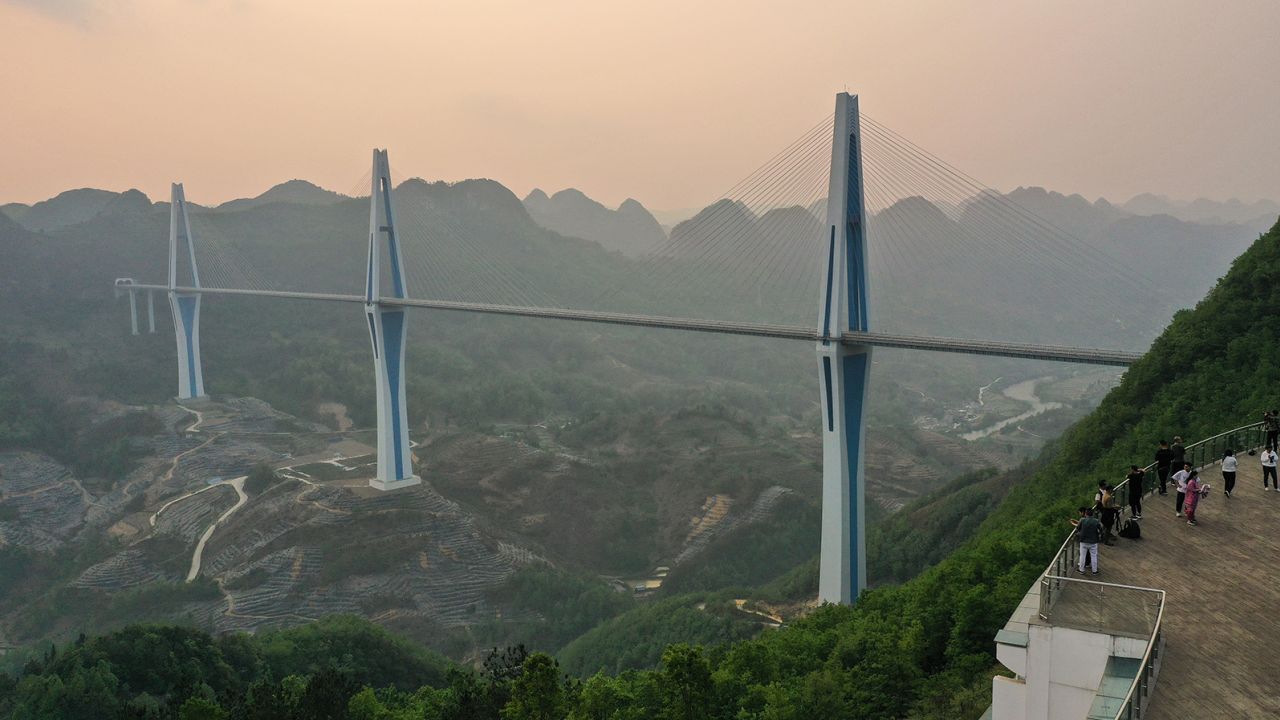 The Pingtang Bridge links two cities in southwest China's Guizhou province. It's one of the tallest bridges in the world. Guizhou government has borrowed heavily to fund its infrastructure spending.