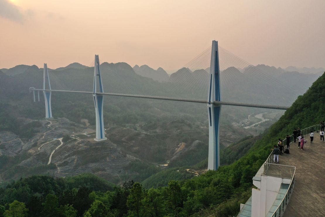 The Pingtang Bridge links two cities in southwest China's Guizhou province. It's one of the tallest bridges in the world. Guizhou government has borrowed heavily to fund its infrastructure spending.