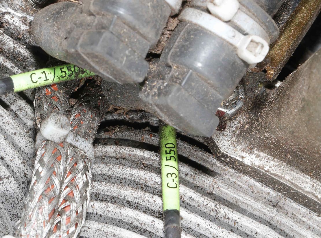 Cables in the Mado engine, displaying labels that probably refer to the MD-550 model designation documented by a CAR field investigation team in Kyiv, Ukraine, on 20 January 2023.