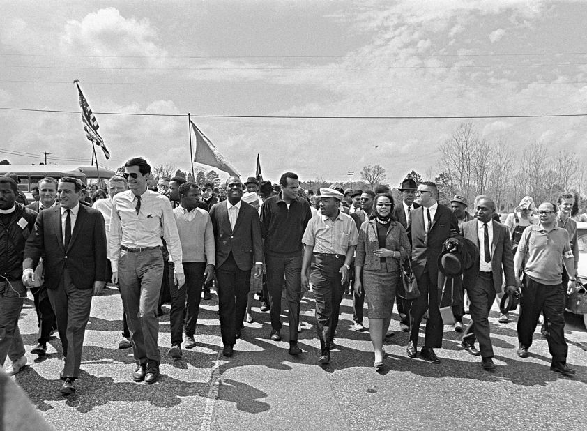 Belafonte, center, marches with Martin Luther King Jr. and others near the Alabama State Capitol in Montgomery in 1965.