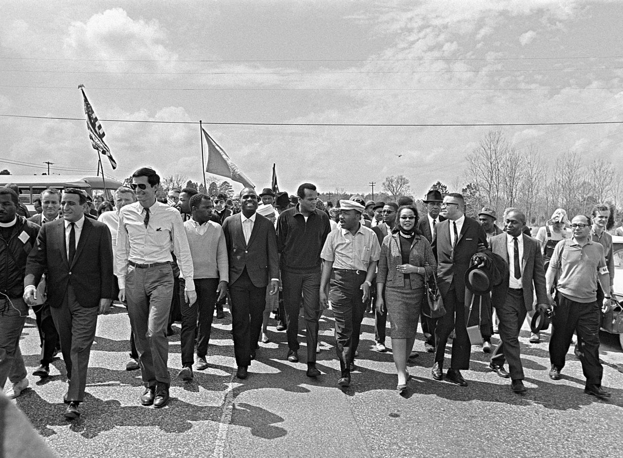 Belafonte, center, marches with Martin Luther King Jr. and others near the Alabama State Capitol in Montgomery in 1965.