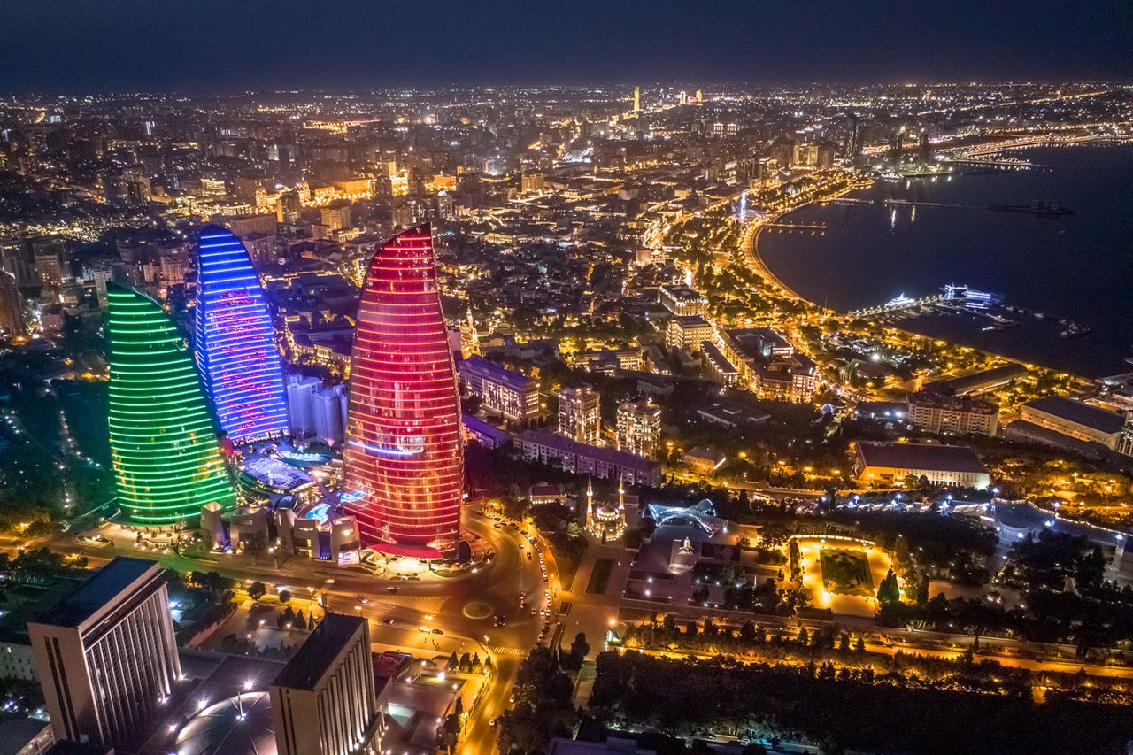 Azerbaijan's vibrant capital Baku lies on the shore of the Caspian Sea. Dominating the skyline here are the Flame Towers, a nod to the country's nickname of "Land of Fire."