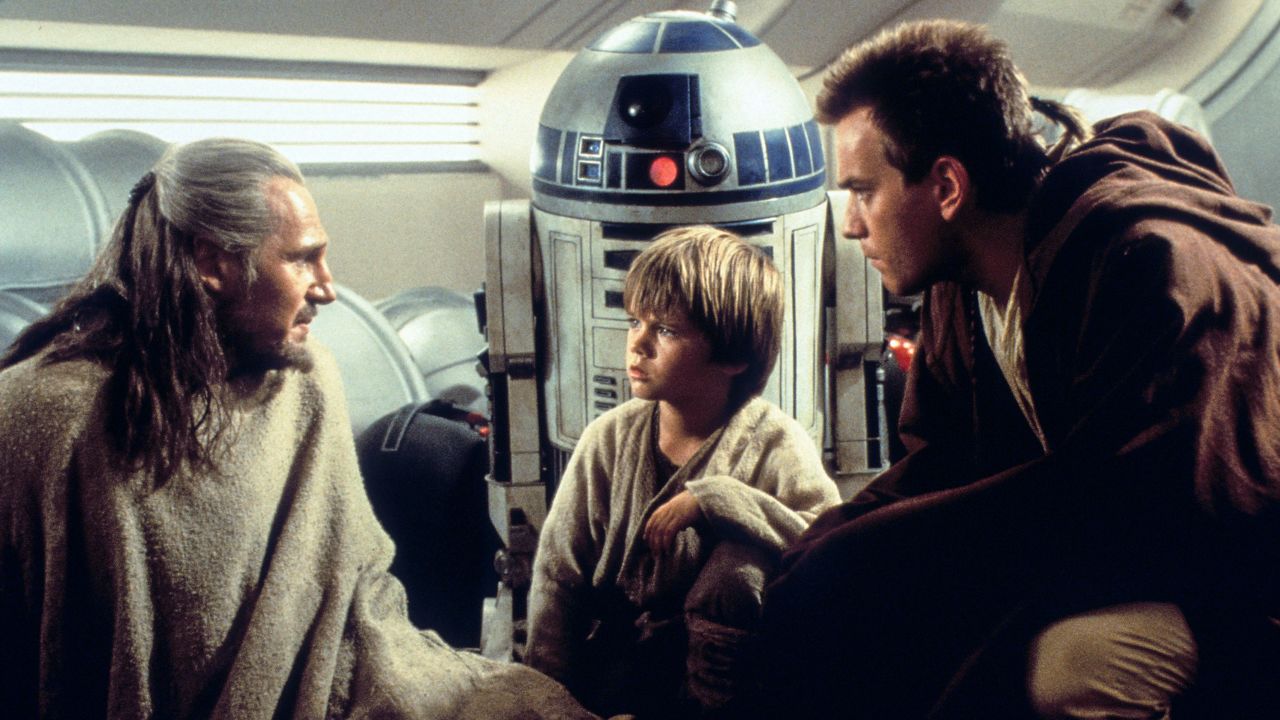 Qui-Gon Jin, R2-D2, Anakin Skywalker and Obi-Wan Kenobi have a fateful meeting in "The Phantom Menace."