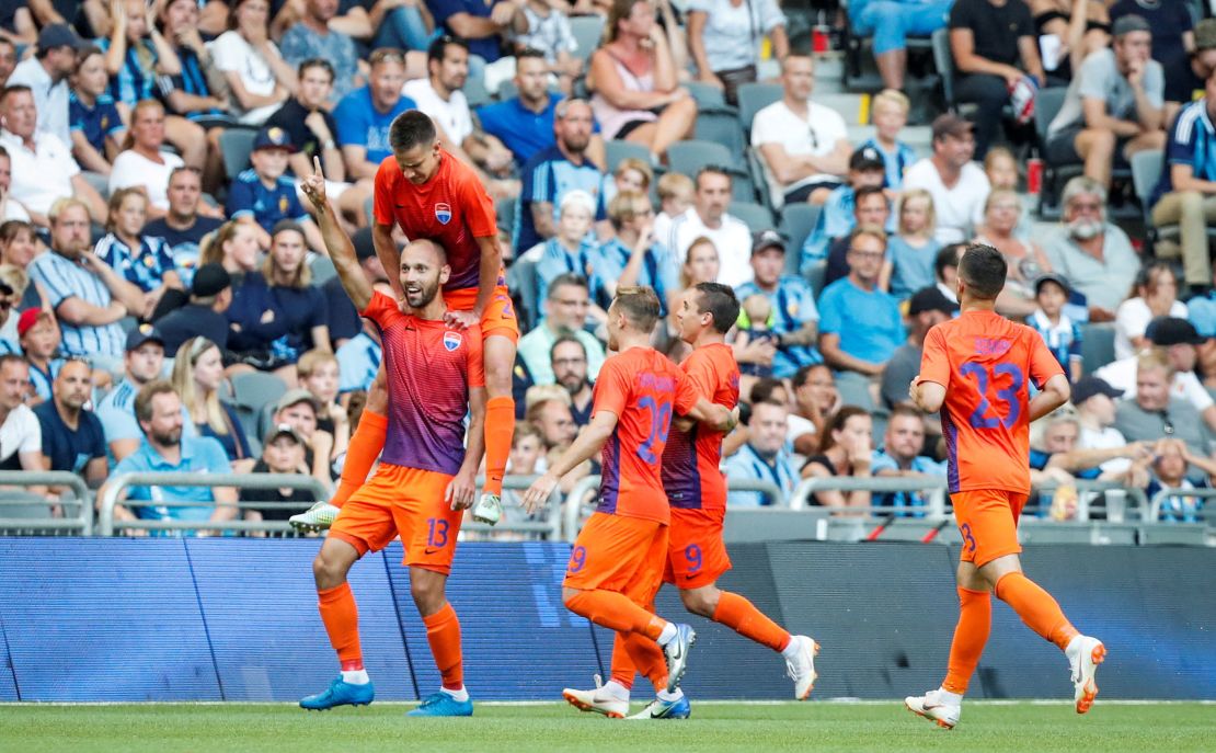 Mariupol's Sergiy Yavorsky celebrates with his teammates after scoring against Djurgardens IF in the UEFA Europa League second qualifying round in 2018.
