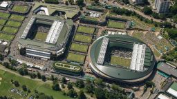 TOPSHOT - An aerial photograph taken from a helicopter shows a general view of The All England Lawn Tennis Club in Wimbledon, southwest London, on the fourth day of the 2019 Wimbledon Championships on July 4, 2019. (Photo by Thomas LOVELOCK / AELTC / POOL / AFP) / RESTRICTED TO EDITORIAL USE        (Photo credit should read THOMAS LOVELOCK/AFP via Getty Images)