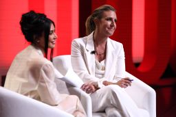 Kim Kardashian and Poppy Harlow speak onstage at the 2023 Time 100 Summit.