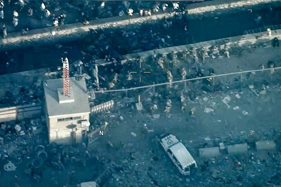 FILE - This image from a video released by the Department of Defense shows U.S. Marines around the scene at Abbey Gate outside Hamid Karzai International Airport on Aug. 26, 2021, in Kabul Afghanistan, after a suicide bomber detonated an explosion.  The Taliban have killed the senior Islamic State group leader behind the August 2021 bombing outside the Kabul airport that killed 13 service members and about 170 Afghans. That is according to the father of a Marine killed in the attack who was briefed on April 25, 2023, by military officials. (Department of Defense via AP, File)