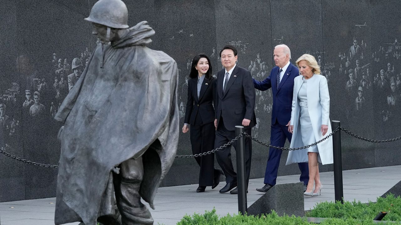 President Joe Biden, first lady Jill Biden, South Korea's President Yoon Suk Yeol and his wife Kim Keon Hee visit the Korean War Veterans Memorial in Washington, Tuesday.
