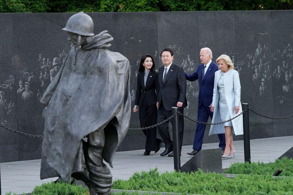 President Joe Biden, first lady Jill Biden, South Korea's President Yoon Suk Yeol and his wife Kim Keon Hee visit the Korean War Veterans Memorial in Washington, Tuesday.