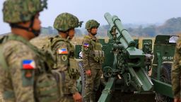 Filipino soldiers prepare for shelling during a combined field artillery live fire exercise as part of the US-The Philippines Balikatan military exercises, amid growing threats from China, near New Clark City, The Philippines, 14 April 2023.