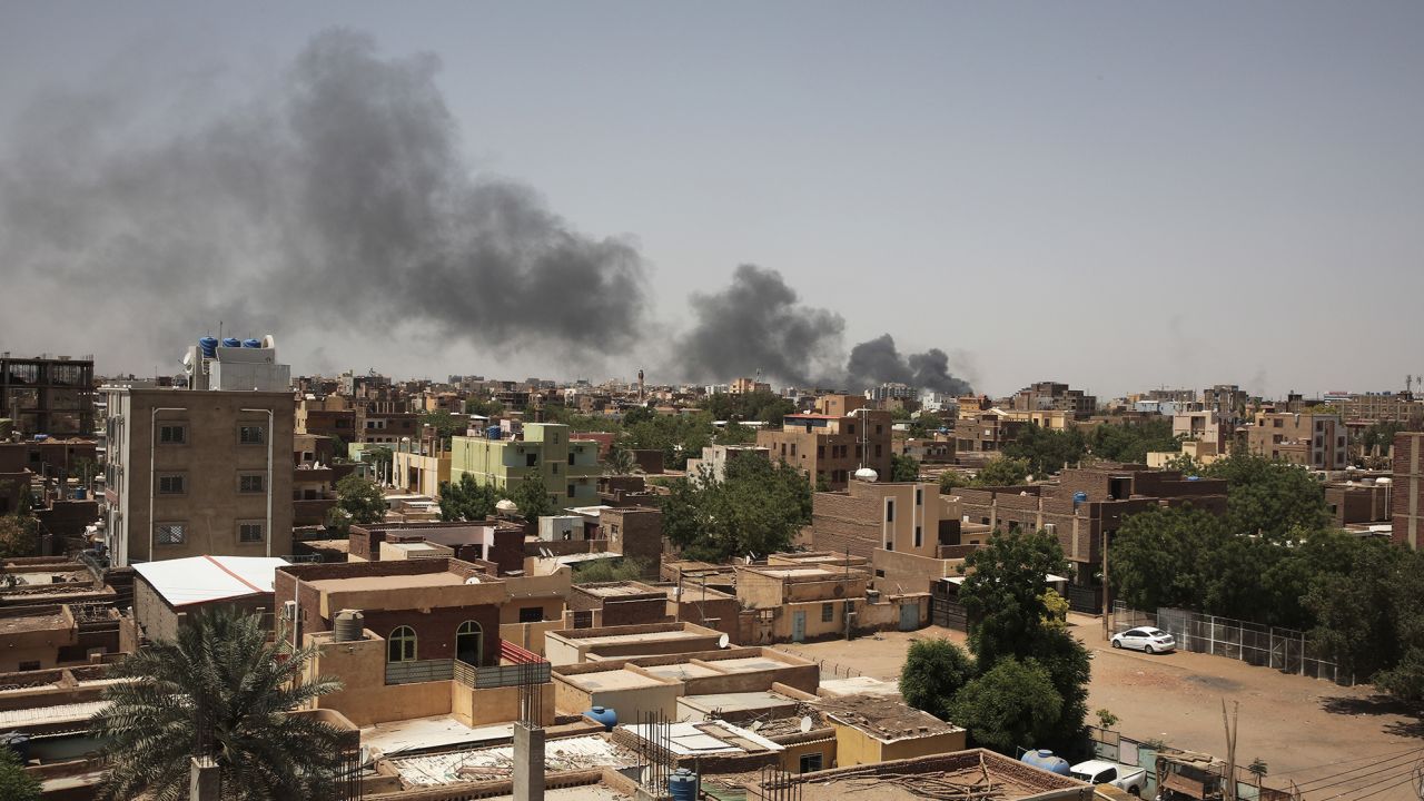 Smoke rises over Khartoum.
