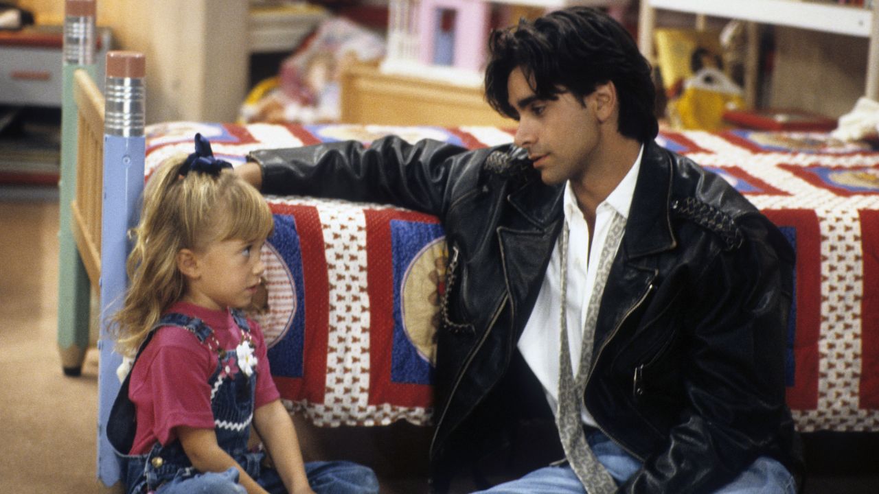Ashley Olsen and John Stamos in "Full House" in 1992.