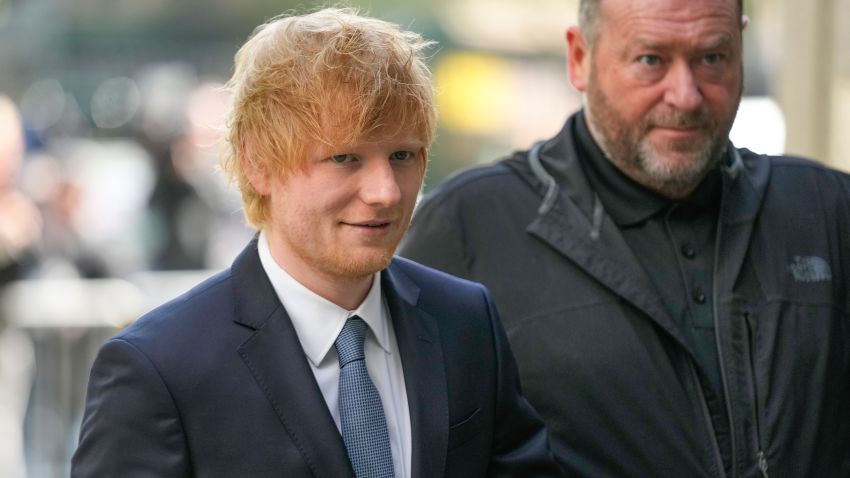 Ed Sheeran, left, arrives at Manhattan federal court in New York, Wednesday, April 26, 2023. The heirs of Ed Townsend, Marvin Gaye's co-writer of the 1973 soul classic, sued Sheeran, alleging the English pop star's hit 2014 tune has "striking similarities" to "Let's Get It On" and "overt common elements" that violate their copyright.